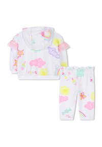 Tweedelig outfit voor kinderen met een witte, gevoerde jas met capuchon en bijpassende broeken. Beide hebben kleurrijke, speelse patronen, waaronder sterren en zonontwerpen.