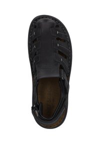 Black leather sandal with multiple open cutouts, stitched detailing, and a cushioned insole. Features a closed heel and adjustable strap.