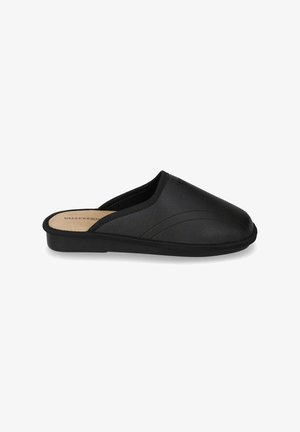 Pantofole nere slip-on con una texture liscia, caratterizzate da una punta arrotondata, una dettagliata cucitura in rilievo e una soletta imbottita. Suola in gomma piatta.