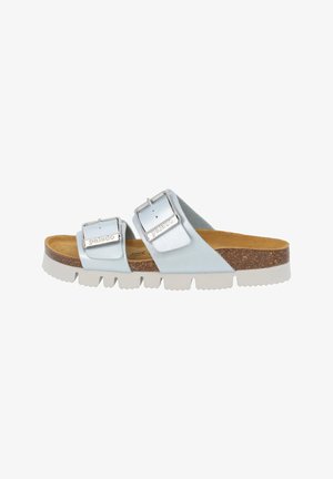 Light blue slide sandal with two adjustable metal buckles, cork footbed, and white rubber sole featuring textured tread.