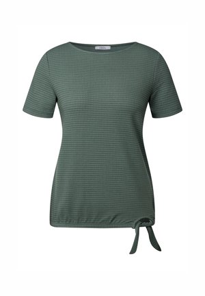 Groene top met korte mouwen, een gestructureerd patroon, ronde halslijn en een knoopdetail aan de zijkant voor een verstelbare pasvorm. Gemaakt van zachte stof.
