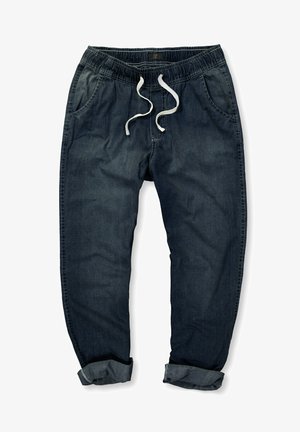 Granatowe spodnie dresowe wykonane z dżinsu, z elastycznym pasem w kolorze białym z sznurkiem do ściągania, kieszeniami po bokach oraz podwiniętymi mankietami.