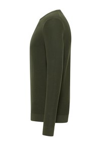 Grön stickad tröja med rund halsringning, långa ärmar och ribbade muddar. Tyget har en slät textur och en figursydd design.