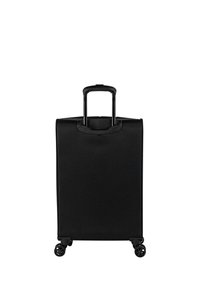 Maleta negra con un acabado liso y mate, asa retráctil y cuatro ruedas para facilitar la movilidad. Diseño sencillo y rectangular sin adornos adicionales.