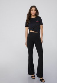 Tezenis Camiseta estampada - schwarz nero stampa ciliegia