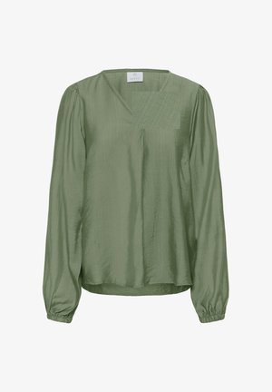 Zelena bluza dugih rukava s V-izrezom, izrađena od teksturiranog, laganog materijala. Ima nabrane manšete i opušteni kroj.