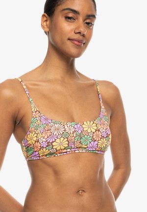 Floral bikini top with a square neckline, featuring multicolored flowers on a brown background. Adjustable thin straps. Smooth fabric texture.