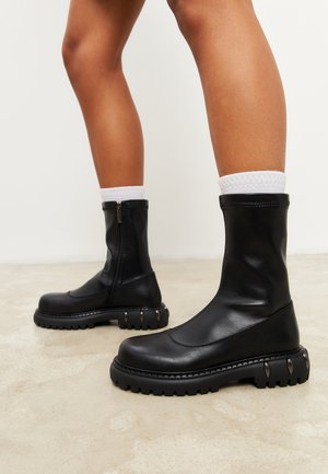 Platform ankle boots - black