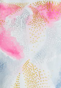 Fabric with a watercolor pattern featuring pink, blue, silver, and gold dots. The texture appears soft and smooth, predominantly white background.
