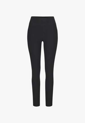 Pantalon slim-fit taille haute noir avec poches avant, conçu pour les femmes, présenté à plat sur un fond blanc.