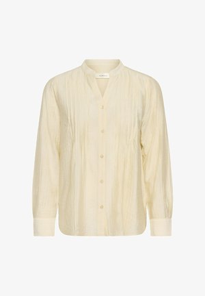 Kremowa bluzka z długim rękawem, z kołnierzykiem mandarynkowym, zapinana na guziki, z teksturowanymi pionowymi paskami i luźnym krojem.