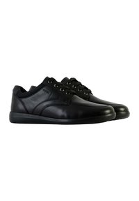 Scarpe in pelle nera con una texture liscia, punta tonda, chiusura con lacci e cuciture laterali a contrasto. Presentano una suola in gomma nera per il comfort.