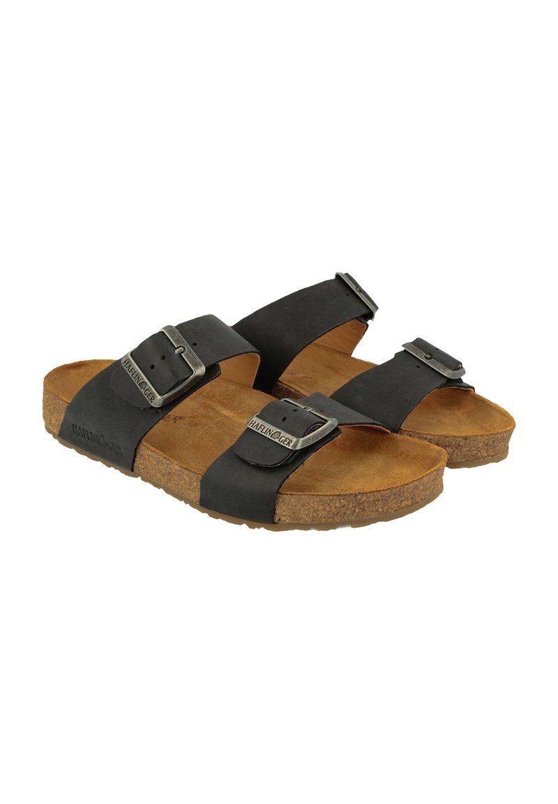 Sandali in pelle nera con due cinghie regolabili e fibbie in metallo. Sottopiede in sughero con superficie texture per il comfort.