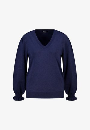 Pull bleu marine à encolure en V, manches longues bouffantes et poignets à volants. Fabriqué dans un tissu doux et texturé.