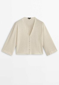 Gevlochten, geknipte cardigan in lichtbeige met een V-hals, driekwart mouwen en verticale ribbelstructuur. Vijf kleine knopen aan de voorkant.