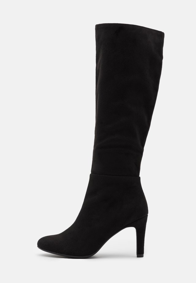 welke laarzen onder jurk