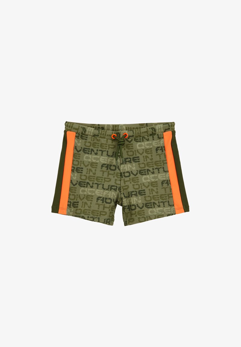 Zaļi peldkostīmi ar melnu tekstu visā virsmā, ar oranžiem sānu akcentiem un aukliņu jostasvietā. Izgatavoti no viegla materiāla.