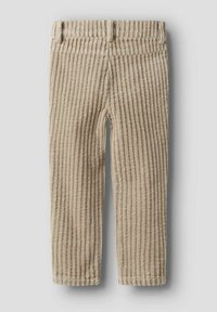 Pantaloni in corduroy beige con strisce verticali, caratterizzati da una vita elastica e orli cuciti. La texture morbida aumenta il comfort e l'interesse visivo.