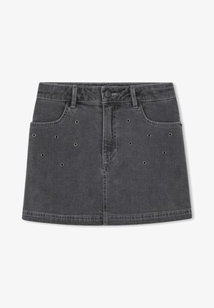 Black denim mini skirt with front pockets, belt loops, and scattered small metal eyelet details on both sides.