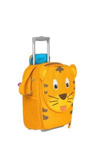 Children's suitcase in bright orange with a tiger design, featuring a face with large eyes, stripes, and a whiskered muzzle; includes retractable handle.