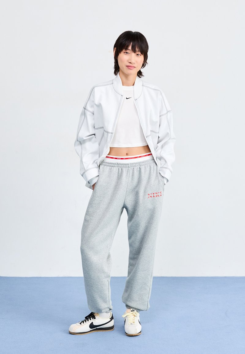 Nike Sportswear PANT Pantalon de survêtement dark grey heather