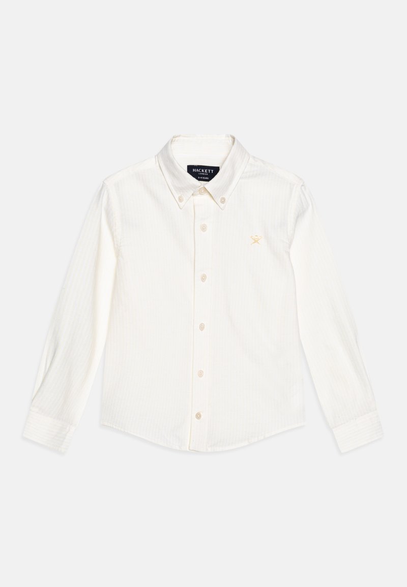 Hvid skjorte med lange ærmer og diskrete lodrette striber, knaplukning med krave, knapper foran og en lille broderet logo i guld.