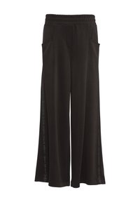 Schwarzweiche weit geschnittene Hose aus weichem Material, mit einem Kordelzugbund, seitlichen Taschen und vertikalen Logoakzenten an den Seiten.