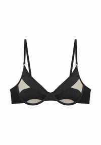 Mustan rintaliivin läpinäkyvillä paneeleilla ja vastakkaisella kankaalla. Varustettu säädettävillä olkaimilla ja sileällä pinnalla. Yksinkertainen muotoilu, jossa on minimaalista metalliosien korostusta.