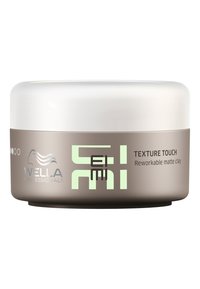 Wella Professionals Texture Touch genanvendelig mat ler i en rund, frostet hvid og taupe-container med grøn tekst.
