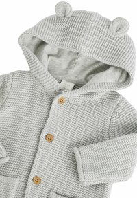 Gray knitted baby cardigan with a hood featuring bear ears, wooden button closures, textured fabric, and front pockets.