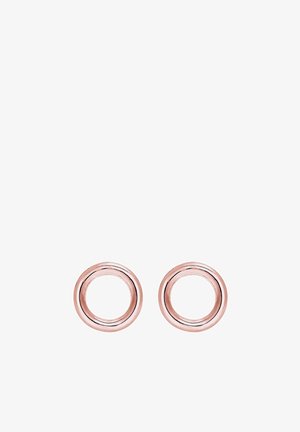 Paire de boucles d'oreilles clous circulaires en or rose lisse et poli avec centres creux sur fond blanc.