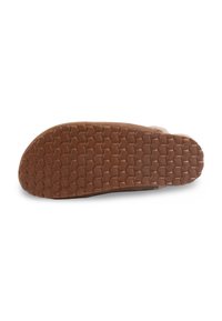 Semelle en caoutchouc brun avec un motif texturé hexagonal. Dispose d'une tige en suede douce avec un design simple. Pas de logos ou d'ornements visibles.