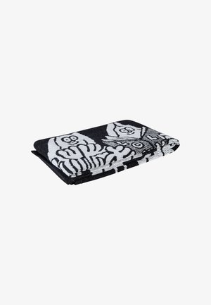Black and white towel featuring an owl design with striped details, made of soft cotton, folded neatly.