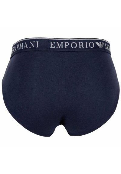 Caleçons en coton bleu marine avec une ceinture contrastante arborant l'inscription et le logo "Emporio Armani". Texture lisse, design taille moyenne.