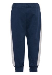 Marinblå bomullsjoggingbyxor med grå sidopaneler, elastisk midja och muddar. Slät yta och tapered passform.