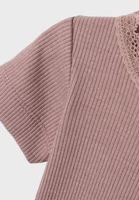 Mauve ribbed knit top with short sleeves and a lace-trimmed neckline, featuring a soft texture and structured design.