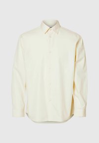 Camicia a maniche lunghe con bottoni in tessuto giallo chiaro. Presenta un colletto classico e un orlo dritto con chiusure a bottone sul davanti.