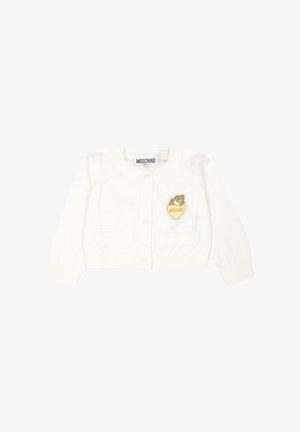 Cardigan lavorato a maglia color crema di Moschino, con colletto rotondo, tre bottoni, due tasche frontali e una patch di un orso sul petto.