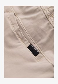 Sélectionné, cream