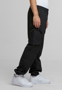 Urban Classics RIPSTOPLOOSE FIT  - Trousers - black