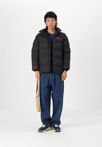 Helly Hansen YU MODULAR PUFFER JACKET UNISEX - Zimska jakna - black