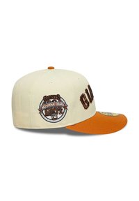 Gorra crema con visera naranja, que presenta la inscripción en relieve "GIANTS" y un parche redondo bordado que muestra "All-Star Game 1991."