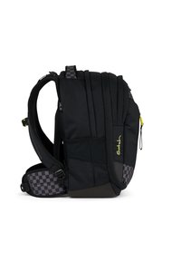 Black backpack with padded sides, adjustable straps, and a checkered accent. Feature a front pocket and zipper pull with bright yellow detail.
