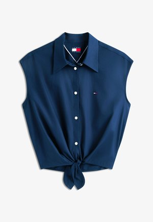 Marineblauw mouwloos blouse met knopen, kraag en voorstrik, met klein Tommy Jeans-logo op de borst.