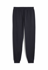 Sorte træningsbukser lavet af et blødt, strækbart stof. Har en elastisk linning og tapered stykker ved anklerne. Ingen synlige mønstre.