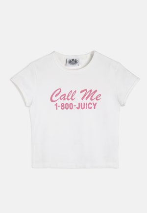 White crop t-shirt made of cotton. Features short sleeves and pink, stylized text reading "Call Me 1-800-JUICY" on the front.