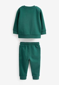 Dunkelgrünes Baumwoll-Trainingsanzug bestehend aus einem Sweatshirt mit Rundhalsausschnitt und schmal zulaufenden Hosen mit elastischem Bund und Bündchen, glatte Textur und ohne Muster.
