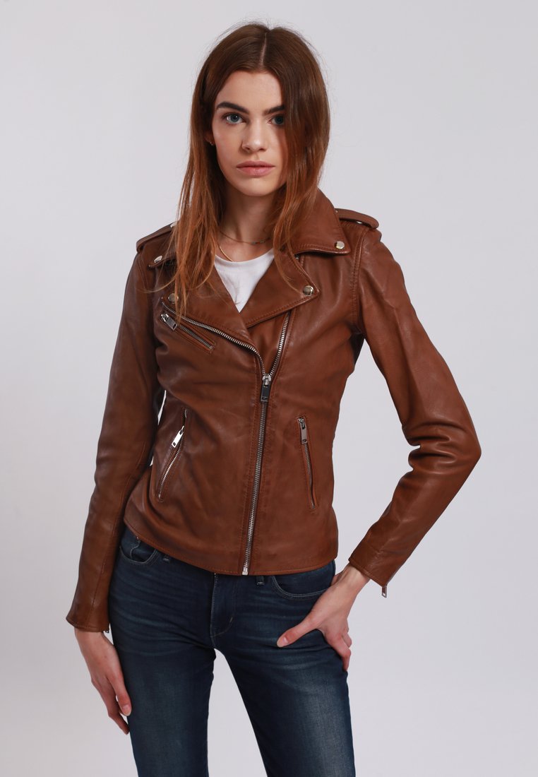 Brown leather biker jacket with a fitted design, asymmetric zip closure, and silver-tone hardware. Features zippered pockets and wide lapels.