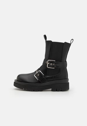 ASPHA - Platform ankle boots - black