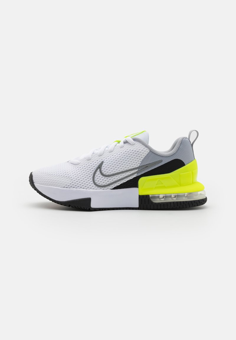 Nike sneakers med en hvid mesh-overdel, grå detaljer, sort sål og en lys gul luftenhed i hælen. Snørebåndsdesign, polstret krave.
